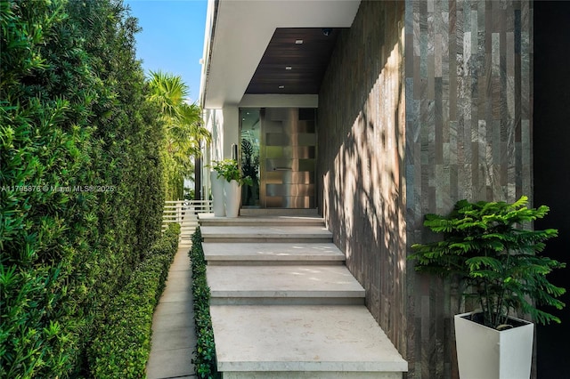 property entrance with fence