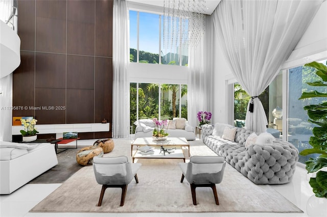 living area featuring a high ceiling