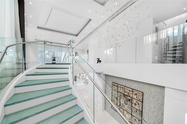 staircase with recessed lighting