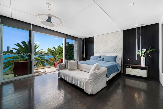 bedroom featuring dark wood-style floors