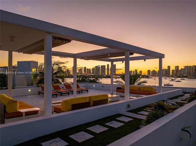 view of patio / terrace featuring an outdoor hangout area and a view of city
