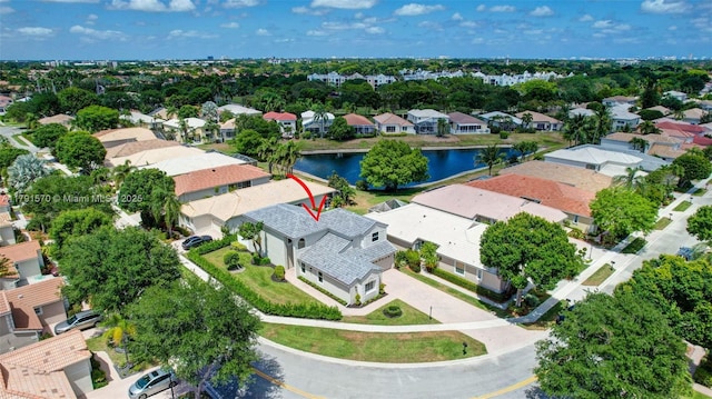 aerial view with a water view and a residential view