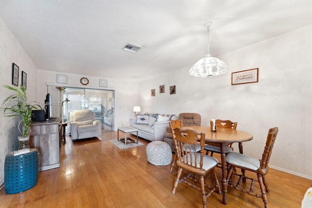 2935 W Crosley Dr Unit B, West Palm Beach, FL 33415 - dining area with light wood finished floors and baseboards