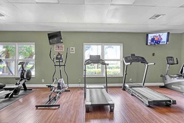 2935 W Crosley Dr Unit B, West Palm Beach, FL 33415 - exercise room featuring wood finished floors, baseboards, and a drop ceiling