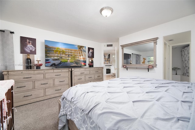 bedroom featuring visible vents