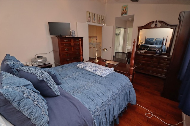 bedroom with wood finished floors