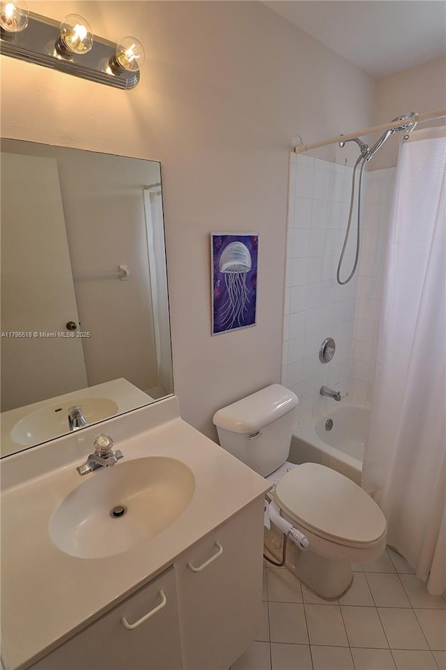 bathroom with vanity, tile patterned floors, shower / bath combination with curtain, and toilet