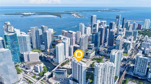 drone / aerial view with a water view and a city view