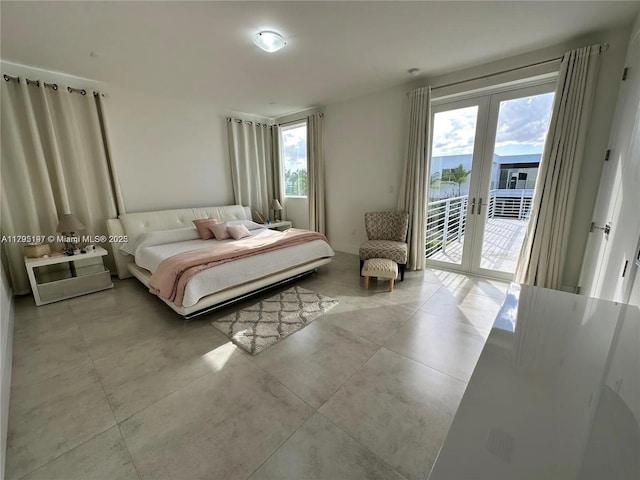bedroom with access to outside and french doors