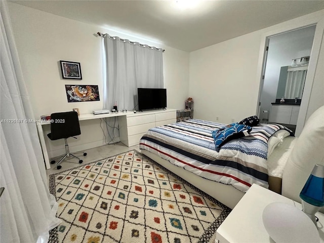 bedroom featuring tile patterned floors