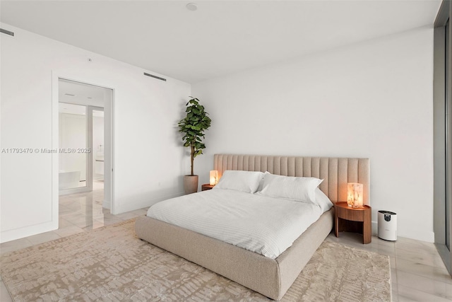 bedroom featuring visible vents