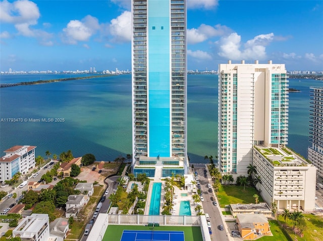 aerial view featuring a water view and a view of city