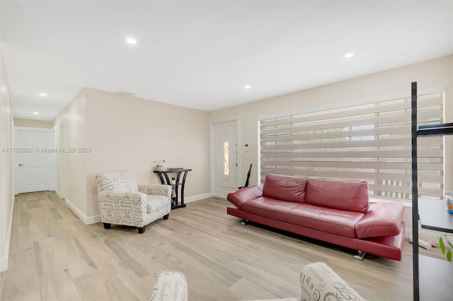 7295 W 14th Ct, Hialeah, FL 33014 - living room featuring wood finished floors, baseboards, and recessed lighting