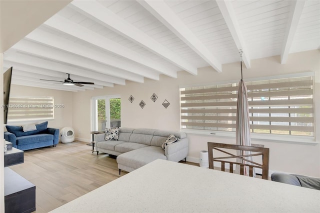 7295 W 14th Ct, Hialeah, FL 33014 - living room featuring wood finished floors, beam ceiling, a ceiling fan, and baseboards