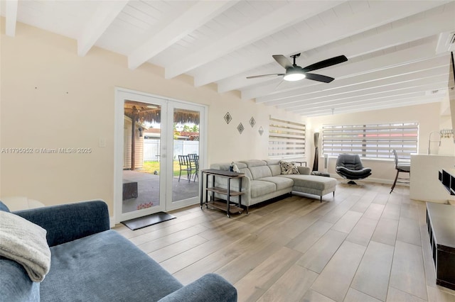 7295 W 14th Ct, Hialeah, FL 33014 - living room with french doors, plenty of natural light, ceiling fan, beam ceiling, and light wood-style floors
