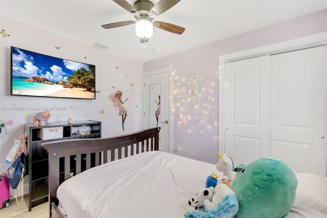 7295 W 14th Ct, Hialeah, FL 33014 - bedroom featuring a closet, ceiling fan, and light wood-style floors