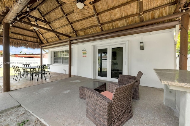 7295 W 14th Ct, Hialeah, FL 33014 - view of patio / terrace with a gazebo, ceiling fan, french doors, and outdoor dining area