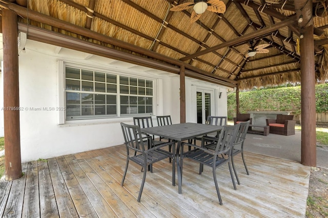 7295 W 14th Ct, Hialeah, FL 33014 - deck featuring a ceiling fan, a gazebo, and outdoor dining area
