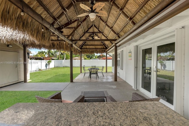7295 W 14th Ct, Hialeah, FL 33014 - view of patio with ceiling fan, a gazebo, and outdoor dining space