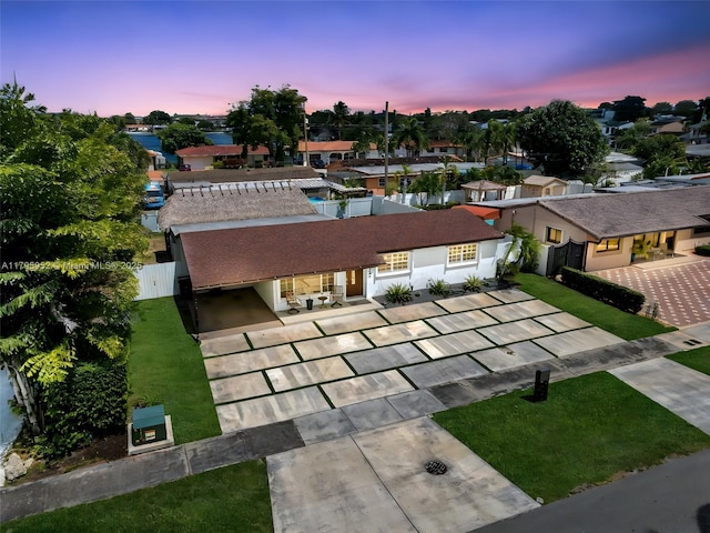 7295 W 14th Ct, Hialeah, FL 33014 - aerial view at dusk of a residential view