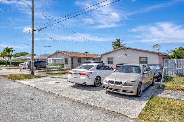 view of front of home with fence