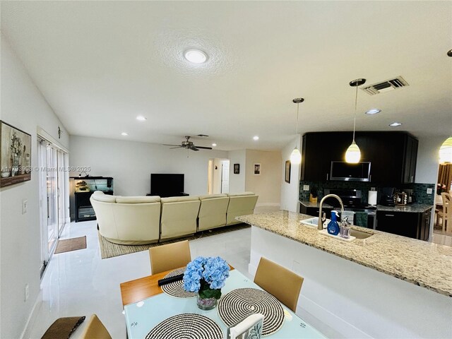 16541 Turquoise Trl, Weston, FL 33331 - dining space with recessed lighting and ceiling fan