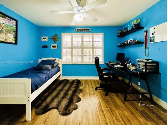 16541 Turquoise Trl, Weston, FL 33331 - bedroom with wood finished floors, a desk, and ceiling fan
