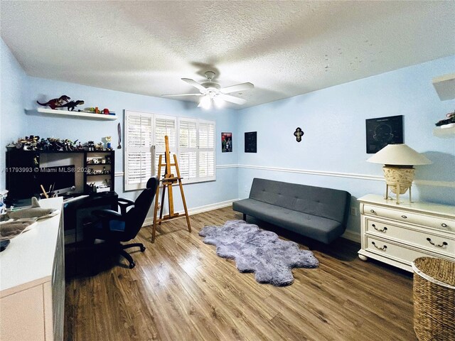 16541 Turquoise Trl, Weston, FL 33331 - office space with wood finished floors, a textured ceiling, and a ceiling fan