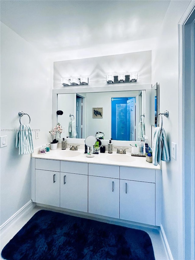 16541 Turquoise Trl, Weston, FL 33331 - full bath with baseboards and double vanity