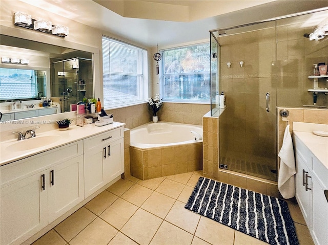 16541 Turquoise Trl, Weston, FL 33331 - full bath with vanity, healthy amount of natural light, a bath, and a shower stall