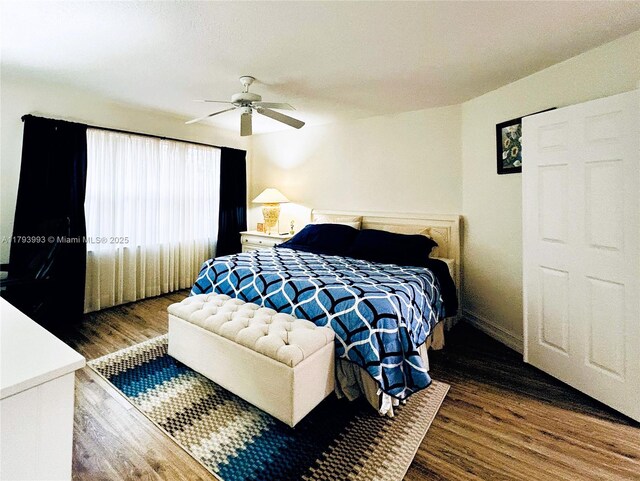 16541 Turquoise Trl, Weston, FL 33331 - bedroom with wood finished floors and a ceiling fan