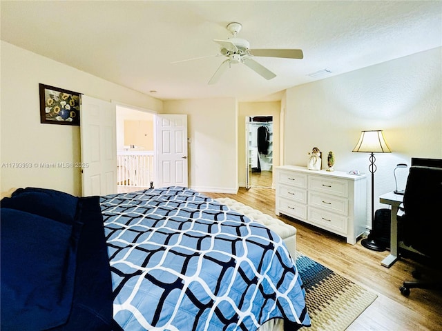 16541 Turquoise Trl, Weston, FL 33331 - bedroom with light wood-type flooring and ceiling fan