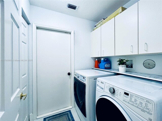 16541 Turquoise Trl, Weston, FL 33331 - laundry room with cabinet space and independent washer and dryer