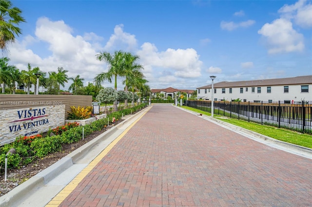 surrounding community featuring fence