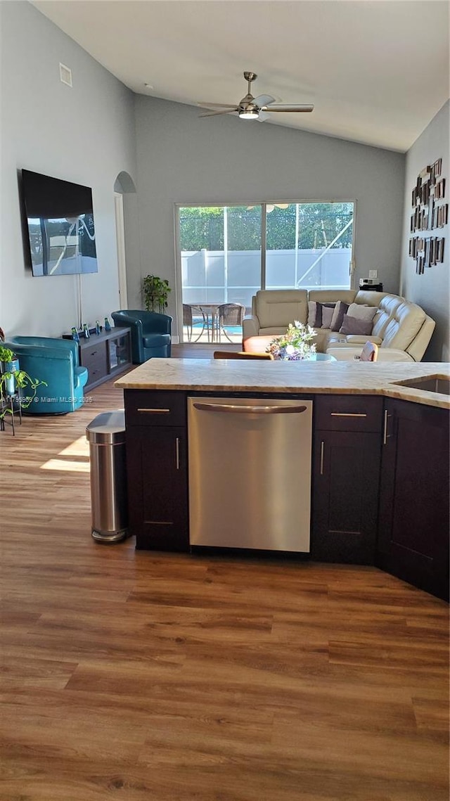 7310 NW 17th Ct, Pembroke Pines, FL 33024 - kitchen featuring stainless steel dishwasher, lofted ceiling, open floor plan, light wood-style flooring, and ceiling fan