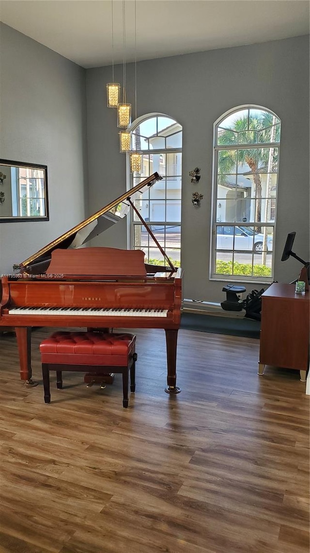 7310 NW 17th Ct, Pembroke Pines, FL 33024 - sitting room featuring wood finished floors and a chandelier