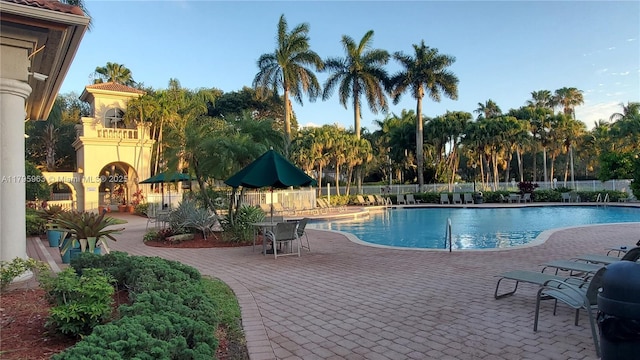 7310 NW 17th Ct, Pembroke Pines, FL 33024 - community pool with fence and a patio area