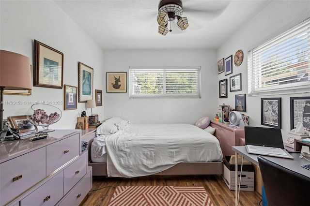 bedroom featuring dark wood-type flooring