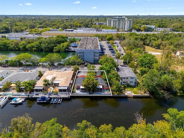 birds eye view of property featuring a water view