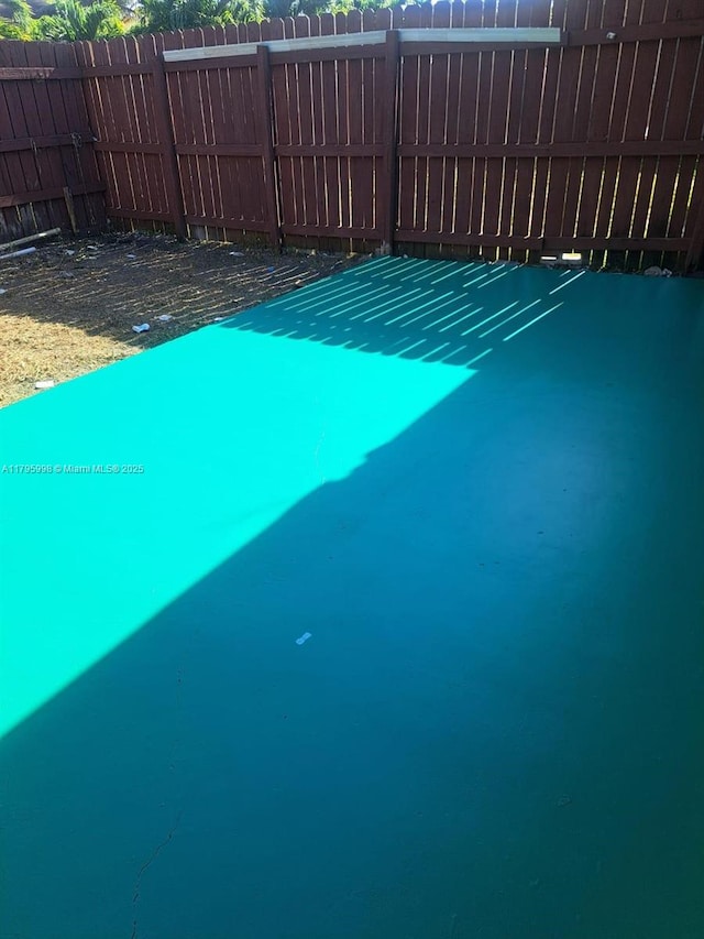 view of pool with fence