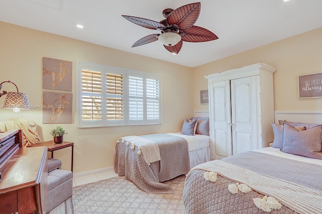 bedroom with recessed lighting, ceiling fan, and light tile patterned flooring
