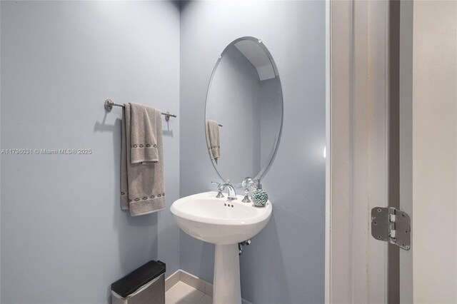 bathroom featuring baseboards