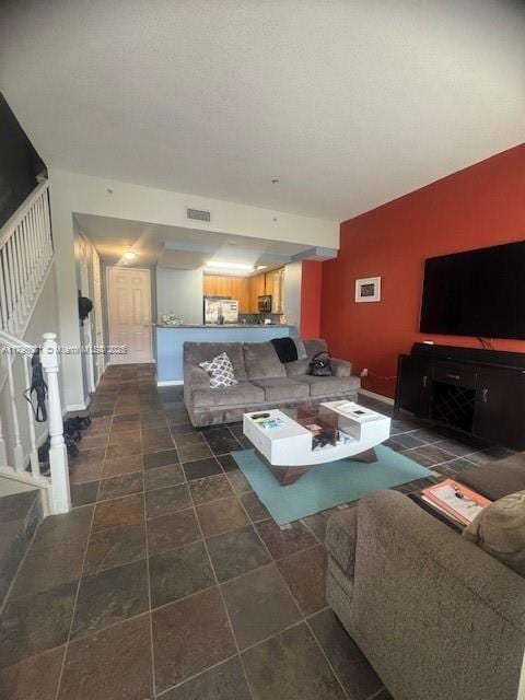 living room with stairway