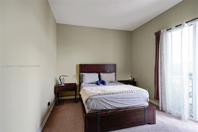 2633 NE 14th Ave Unit 110, Wilton Manors, FL 33334 - corridor with baseboards