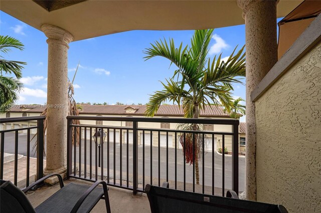 2633 NE 14th Ave Unit 110, Wilton Manors, FL 33334 - full bathroom with visible vents, vanity, tile patterned flooring, toilet, and a shower stall