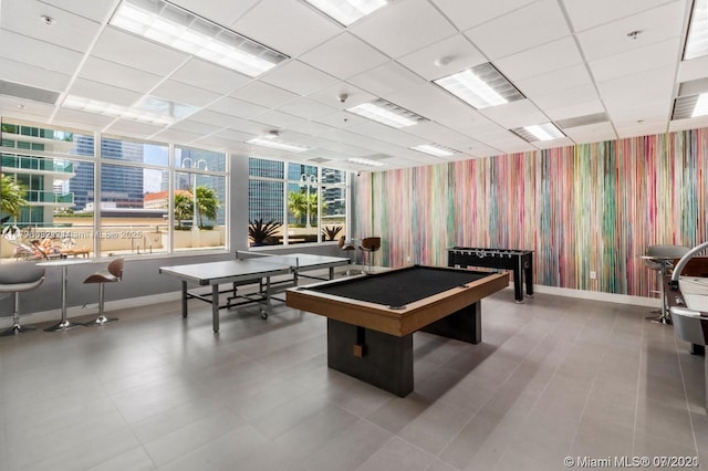 1200 Brickell Bay Dr Unit 2807, Miami, FL 33131 - rec room with baseboards, pool table, and wallpapered walls