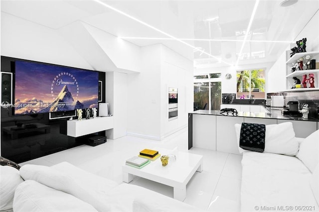 living area with light tile patterned floors