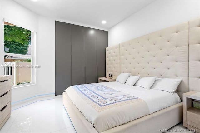 bedroom featuring recessed lighting