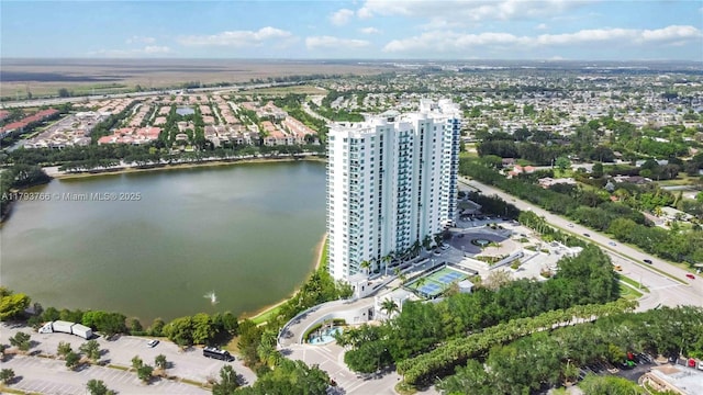 drone / aerial view with a water view