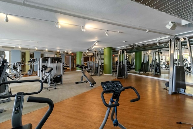 exercise room with track lighting